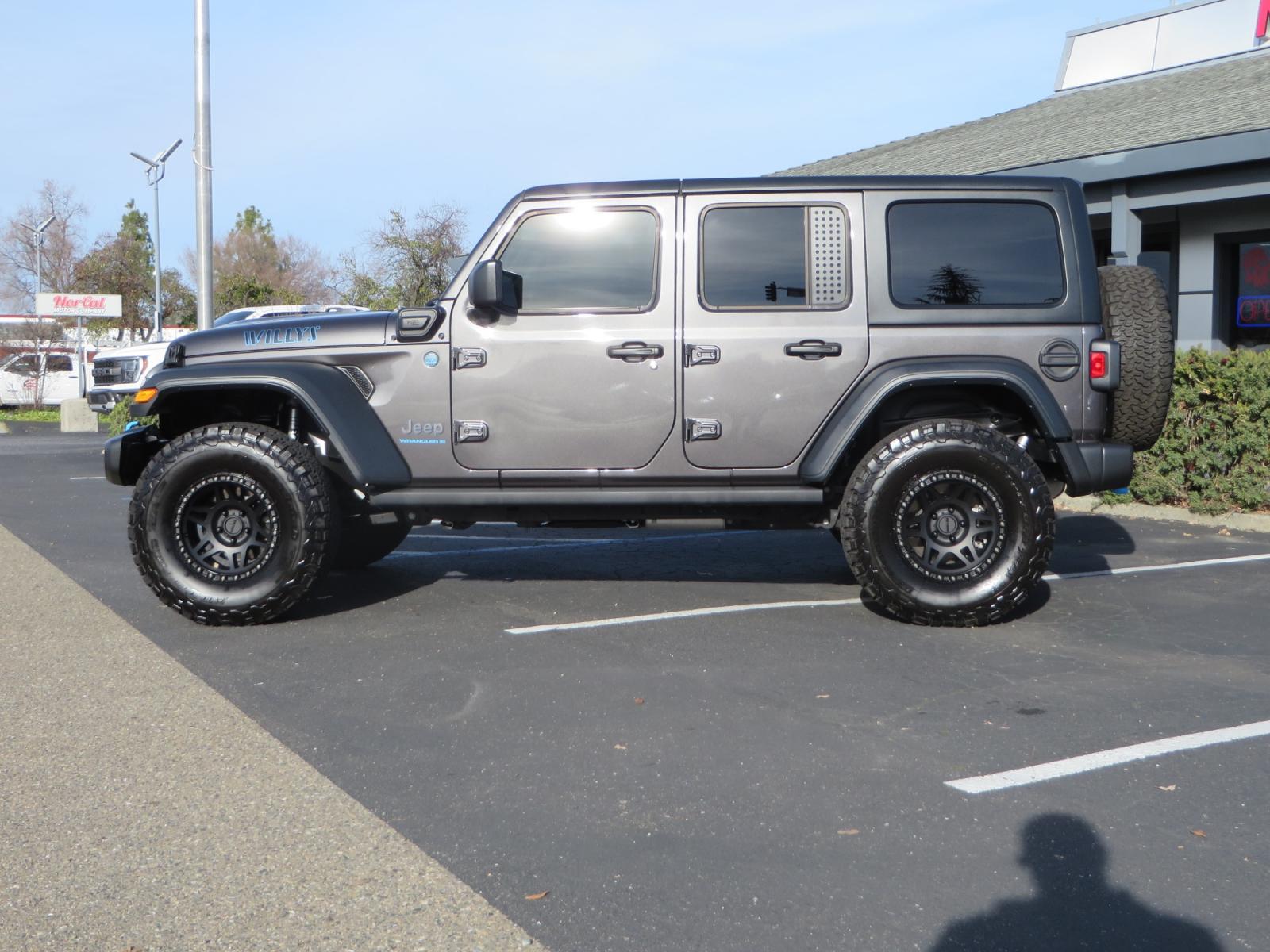 2023 CHARCOAL /black Jeep Wrangler Unlimited Willys 4XE (1C4JJXN68PW) with an 2.0L L4 DOHC 16V HYBRID engine, 8A transmission, located at 2630 Grass Valley Highway, Auburn, CA, 95603, (530) 508-5100, 38.937893, -121.095482 - 3" Zone Offroad lift kit, Fox Adventure series shocks, 17" Method Race wheels, 37" BFG KO2 tires, and a Teraflex spare tire carrier. - Photo #7
